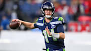 Oct 20, 2025; Seattle, Washington, USA; Seattle Seahawks quarterback Sam Darnold (14) warms up prior to the game against the Houston Texans at Lumen Field.