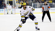 Mar 7, 2025; Ann Arbor, MI, USA;  Michigan Wolverines forward Michael Hage (19) skates with the puck against Penn State  during a Big Ten Tournament quarter final game at Yost Arena. Mandatory Credit: Rick Osentoski-Imagn Images