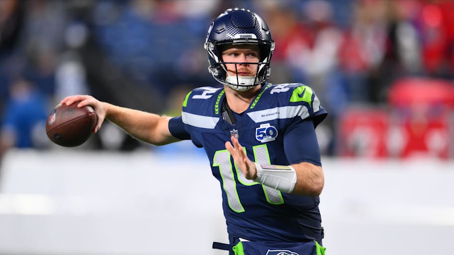 Sam Darnold winds up to throw a pass for the Seahawks.