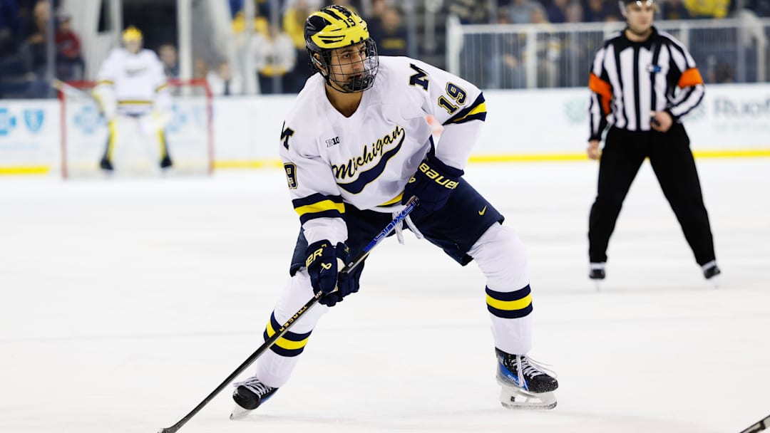 Mar 7, 2025; Ann Arbor, MI, USA;  Michigan Wolverines forward Michael Hage (19) skates with the puck against Penn State  during a Big Ten Tournament quarter final game at Yost Arena. Mandatory Credit: Rick Osentoski-Imagn Images
