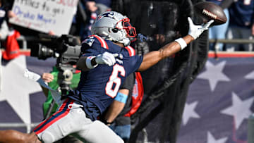 New England Patriots wide receiver Javon Baker (6) warms up before a game against the Los Angeles Rams at Gillette Stadium.