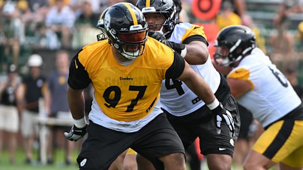 Football player in yellow practice uniform