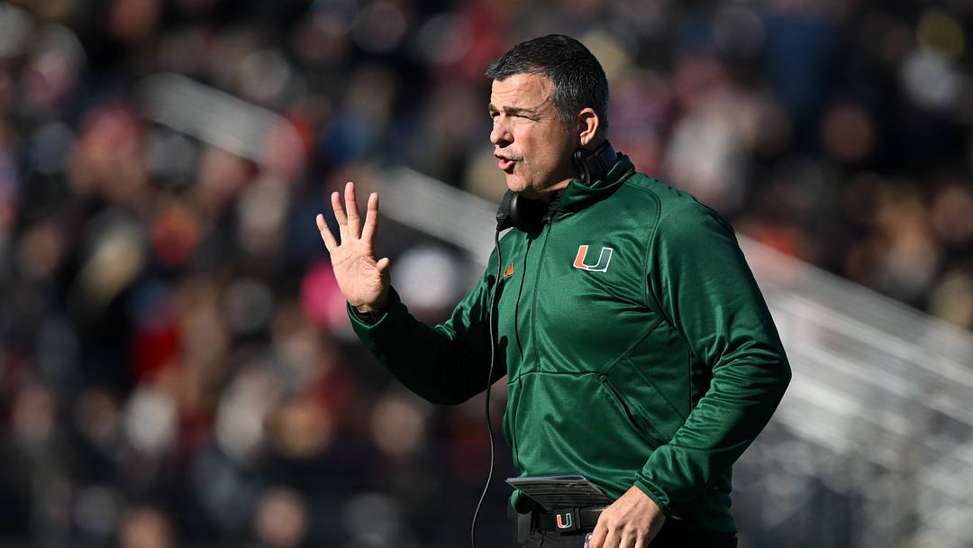 Nov 24, 2023; Chestnut Hill, Massachusetts, USA; Miami Hurricanes head coach Mario Cristobal calls a play against the Boston College Eagles during the first half at Alumni Stadium. Mandatory Credit: Brian Fluharty-USA TODAY Sports