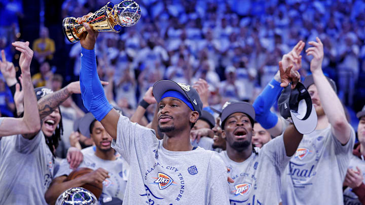 Oklahoma City Thunder guard Shai Gilgeous-Alexander celebrates with the West Conference Finals MVP trophy after defeating the Minnesota Timberwolves. Oklahoma City Thunder guard Shai Gilgeous-Alexander celebrates with the West Conference Finals MVP trophy after defeating the Minnesota Timberwolves.