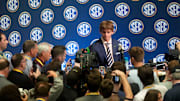 July 15, 2025; Atlanta, GA, USA; Texas quarterback Arch Manning is surrounded by media as he participates in SEC Media Days at the College Football Hall of Fame in Atlanta.