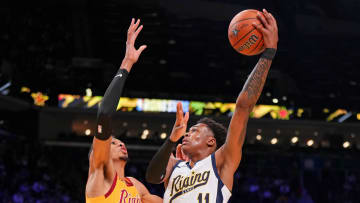 Feb 16, 2024; Indianapolis, Indiana, USA; Team Detlef forward Tyler Smith (11) of the G League Ignite shoots the ball against Team Pau center Victor Wembanyama (1) of the San Antonio Spurs during a Rising Stars semifinal game at Gainbridge Fieldhouse. Mandatory Credit: Kyle Terada-USA TODAY Sports