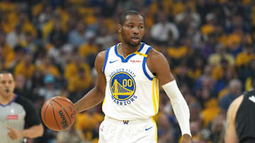 Apr 26, 2025; San Francisco, California, USA; Golden State Warriors forward Jonathan Kuminga (00) handles the ball against the Houston Rockets during the first quarter of game three of first round for the 2024 NBA Playoffs at Chase Center. Mandatory Credit: Darren Yamashita-Imagn Images