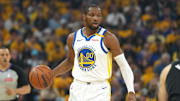Apr 26, 2025; San Francisco, California, USA; Golden State Warriors forward Jonathan Kuminga (00) handles the ball against the Houston Rockets during the first quarter of game three of first round for the 2024 NBA Playoffs at Chase Center. Mandatory Credit: Darren Yamashita-Imagn Images