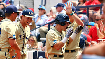 Jun 1, 2025; Oxford, MS, USA; Georgia Tech Yellowjackets shortstop Kyle Lodise (2) reacts with teammates as he returns to the dugout after a home run during the first inning against the Mississippi Rebels. Mandatory Credit: Petre Thomas-Imagn Images
