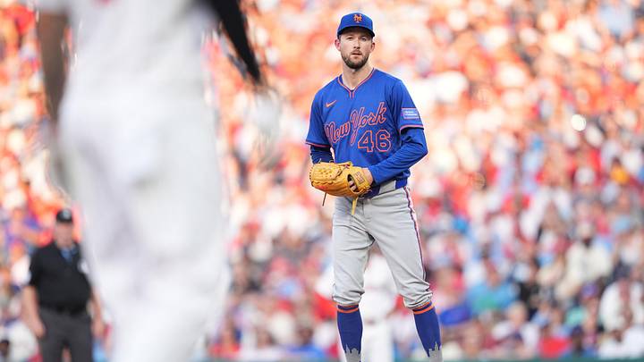 Jun 21, 2025; Philadelphia, Pennsylvania, USA; New York Mets starting pitcher Griffin Canning (46) checks a runner against the Philadelphia Phillies in the first inning at Citizens Bank Park. Mandatory Credit: Kyle Ross-Imagn Images