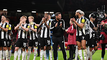 Newcastle United players celebrate at Old Trafford on Monday night