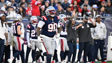 Nov 17, 2024; Foxborough, Massachusetts, USA; New England Patriots defensive tackle Christian Barmore (90) runs to the line during the second half against the Los Angeles Rams at Gillette Stadium. Mandatory Credit: Eric Canha-Imagn Images