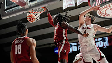 The University of Alabama unveiled the first banner honoring the school’s first Final Four appearance Friday, Oct. 11, 2024, in Coleman Coliseum. Alabama center Clifford Omoruyi (11) throws down a forceful dunk as he rips past Alabama forward Grant Nelson (4) during the scrimmage portion of the evening.