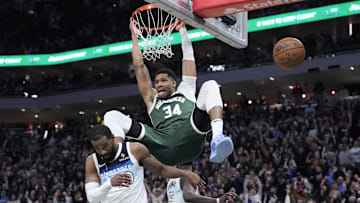 Apr 8, 2025; Milwaukee, Wisconsin, USA; Milwaukee Bucks forward Giannis Antetokounmpo (34) dunks the ball against Minnesota Timberwolves guard Mike Conley (10) in the second half at Fiserv Forum. Mandatory Credit: Michael McLoone-Imagn Images
