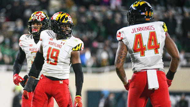 Nov 13, 2021; East Lansing, Michigan, USA; Maryland Terrapins linebacker Branden Jennings (44) and linebacker Ahmad McCulloug