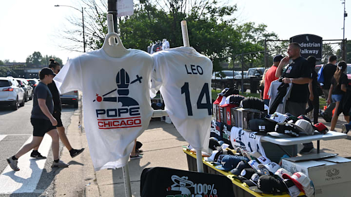 A Pope Leo XIV t-shirt is seen outside for sale prior to a game between the Chicago White Sox and the Kansas City Royals at Rate Field on June 6. A Pope Leo XIV t-shirt is seen outside for sale prior to a game between the Chicago White Sox and the Kansas City Royals at Rate Field on June 6.