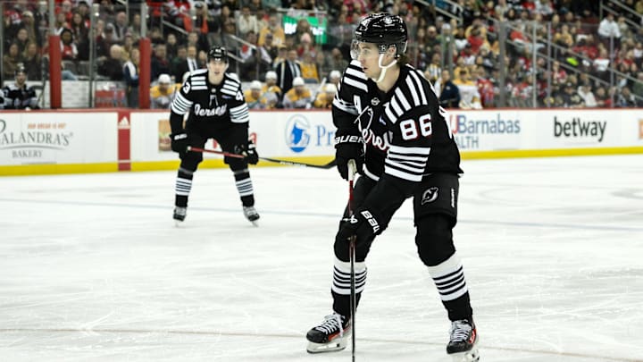 Apr 7, 2024; Newark, New Jersey, USA; New Jersey Devils center Jack Hughes (86) skates with the puck during the second period against the Nashville Predators at Prudential Center. Mandatory Credit: John Jones-Imagn Images