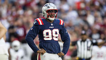 Dec 15, 2024; Glendale, Arizona, USA; New England Patriots defensive end Keion White (99) against the Arizona Cardinals at State Farm Stadium. Mandatory Credit: Mark J. Rebilas-Imagn Images