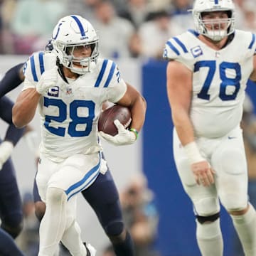 Indianapolis Colts running back Jonathan Taylor (28) rushes for a touchdown Sunday, Dec. 22, 2024, during a game against the Tennessee Titans at Lucas Oil Stadium in Indianapolis.
