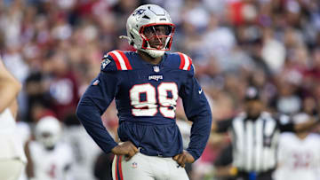 Dec 15, 2024; Glendale, Arizona, USA; New England Patriots defensive end Keion White (99) against the Arizona Cardinals at State Farm Stadium. Mandatory Credit: Mark J. Rebilas-Imagn Images