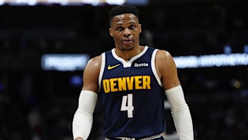 Feb 20, 2025; Denver, Colorado, USA; Denver Nuggets guard Russell Westbrook (4) leaves the court in the fourth quarter gainst the Charlotte Hornets at Ball Arena. Mandatory Credit: Ron Chenoy-Imagn Images