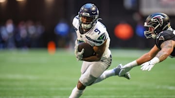 Oct 20, 2024; Atlanta, Georgia, USA; Seattle Seahawks running back Kenneth Walker III (9) runs the ball against the Atlanta Falcons in the first quarter at Mercedes-Benz Stadium. Mandatory Credit: Brett Davis-Imagn Images