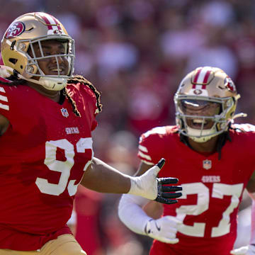 October 20, 2024; Santa Clara, California, USA; San Francisco 49ers defensive tackle Kalia Davis (93) celebrates an interception against the Kansas City Chiefs during the first quarter at Levi's Stadium. Mandatory Credit: Kyle Terada-Imagn Images