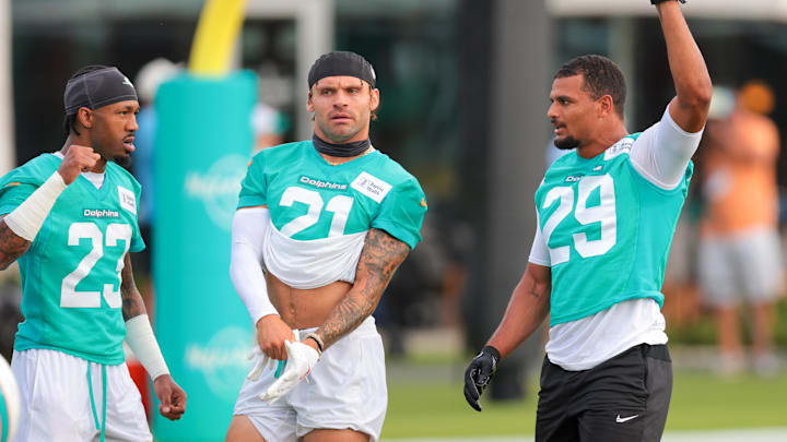 Miami Dolphins safety Minkah Fitzpatrick (right), safety Ashtyn Davis (center) and cornerback Jack Jones (left) work during training camp at Baptist Health Training Complex. Miami Dolphins safety Minkah Fitzpatrick (right), safety Ashtyn Davis (center) and cornerback Jack Jones (left) work during training camp at Baptist Health Training Complex.