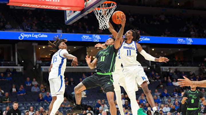 CJ Brown drives the lane for USF