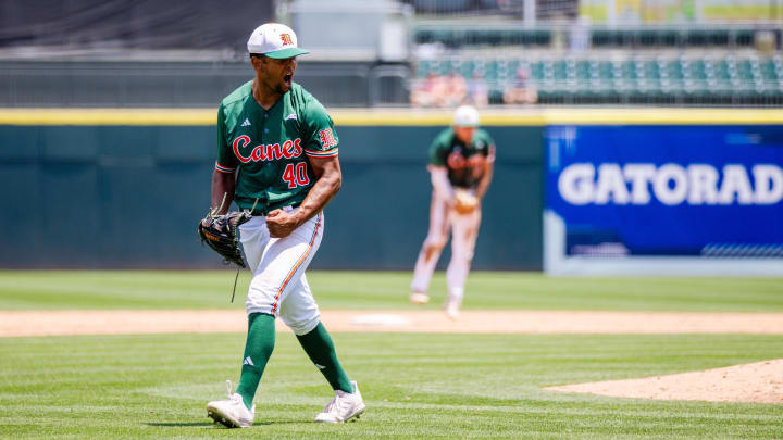 May 23, 2024; Charlotte, NC, USA; Miami (Fl) Hurricanes pitcher Myles Caba (40) celebrates after a strikeout in the eighth inning against the Clemson Tigers during the ACC Baseball Tournament at Truist Field. Mandatory Credit: Scott Kinser-USA TODAY Sports