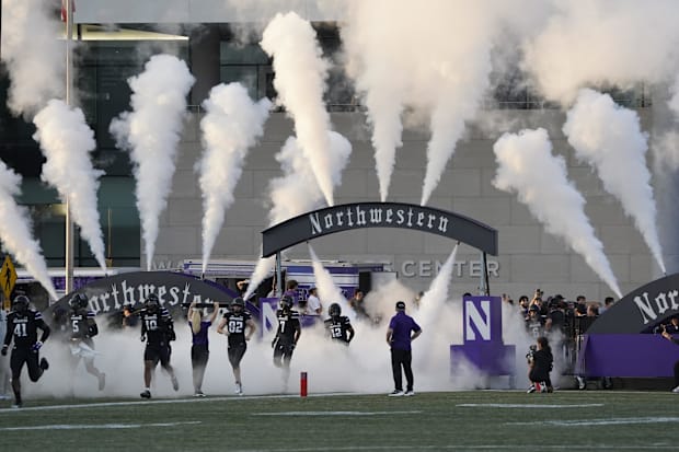 Northwestern Wildcats take the field against the Eastern Illinois Panthers  at Lanny and Sharon Martin Stadium.