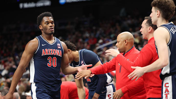 Mar 15, 2025; Kansas City, MO, USA; Arizona Wildcats forward Tobe Awaka (30) reacts with teammates against the Houston Cougars during the first half for the Big 12 Conference Tournament Championship game at T-Mobile Center. Mandatory Credit: William Purnell-Imagn Images