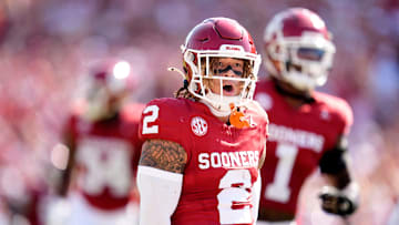 Oklahoma Sooners defensive back Billy Bowman Jr. (2) celebrates an interception in the first half of the Red River Rivalry college football game between the University of Oklahoma Sooners and the Texas Longhorn at the Cotton Bowl Stadium in Dallas, Texas. 