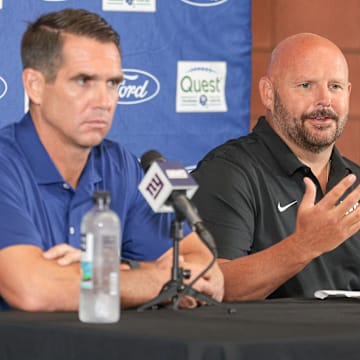 Jul 24, 2024; East Rutherford, NJ, USA; New York Giants head coach Brian Dabol, left, and general manager Joe Schoen talks with media at Quest Diagnostics Training Facility.  