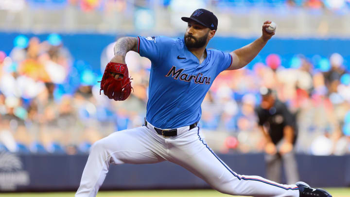 Apr 14, 2024; Miami, Florida, USA; Miami Marlins relief pitcher Tanner Scott (66) delivers a pitch against the Atlanta Braves during the ninth inning at loanDepot Park.