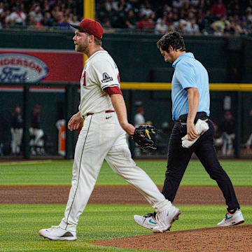 Arizona Diamondbacks starting pitcher Corbin Burnes walks off the mound against the Washington Nationals.