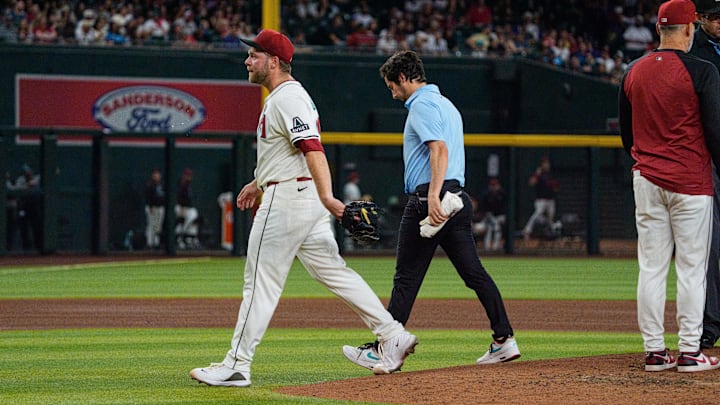 Arizona Diamondbacks starting pitcher Corbin Burnes walks off the mound against the Washington Nationals.