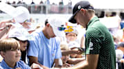 Jul 6, 2024; Silvis, Illinois, USA; Jordan Spieth signs autographs for fans during the third round of the John Deere Classic golf tournament. Mandatory Credit: Joseph Cress-Imagn Images