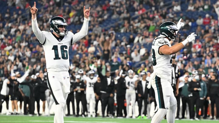 Aug 15, 2024; Foxborough, Massachusetts, USA; Philadelphia Eagles quarterback Tanner McKee (16) reacts after scoring a touchdown against the New England Patriots during the second half at Gillette Stadium. 