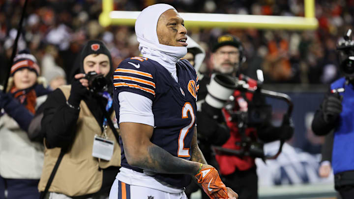 Bears wide receiver DJ Moore reacts after catching the game-winning 46-yard touchdown pass from quarterback Caleb Williams in overtime to beat the Packers on Saturday night.