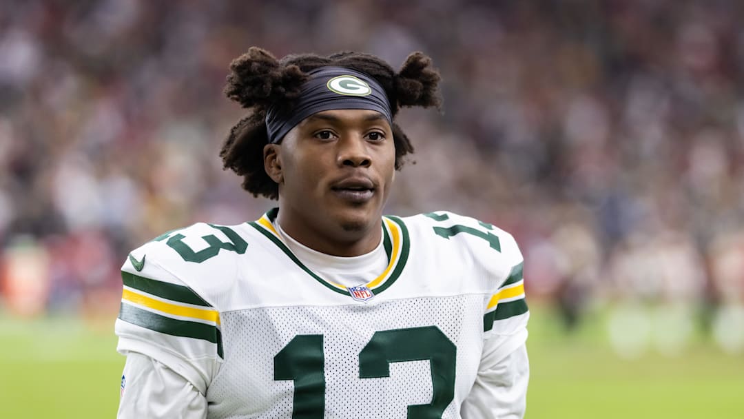 Oct 19, 2025; Glendale, Arizona, USA; Green Bay Packers wide receiver Dontayvion Wicks (13) against the Arizona Cardinals at State Farm Stadium. Mandatory Credit: Mark J. Rebilas-Imagn Images