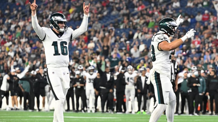 Aug 15, 2024; Foxborough, Massachusetts, USA; Philadelphia Eagles quarterback Tanner McKee (16) reacts after scoring a touchdown against the New England Patriots during the second half at Gillette Stadium. Brian Fluharty-USA TODAY Sports