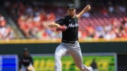 Jul 14, 2024; Cincinnati, Ohio, USA; Miami Marlins starting pitcher Trevor Rogers (28) pitches against the Cincinnati Reds in the first inning at Great American Ball Park.