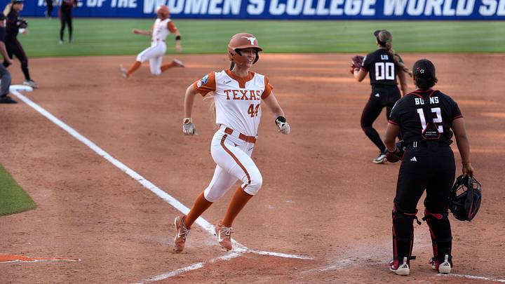 Texas Longhorns utility Kaiah Altmeyer (44) scores a run in the first inning of Game 1 of the NCAA softball Women's College World Series finals between the Texas Longhorns and the Texas Tech Red Raiders at Devon Park in Oklahoma City, Wednesday, June 3, 2026.
