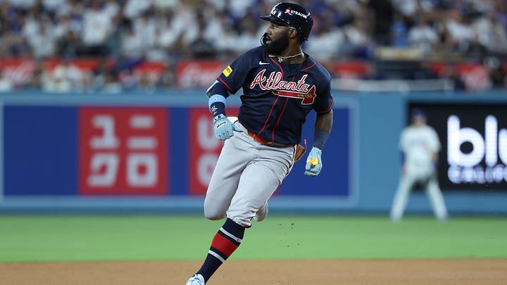 Oct 4, 2026; Los Angeles, California, USA;  Atlanta Braves outfielder Michael Harris II (23) hits a triple during the fifth inning against the Los Angeles Dodgers in game two of the NLDS for the 2026 MLB Playoffs at Uniqlo Field at Dodger Stadium.  Mandatory Credit: Kiyoshi Mio-Imagn Images