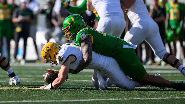 Aug 31, 2024; Eugene, Oregon, USA; Oregon Ducks defensive end Matayo Uiagalelei (10) sacks Idaho Vandals quarterback Jack Lay