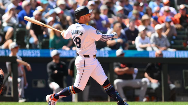 Seattle Mariners designated hitter Mitch Garver hits a home run against the Baltimore Orioles on July 4 at T-Mobile Park.