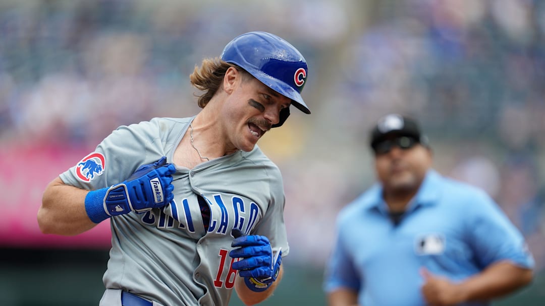 Jul 28, 2024; Kansas City, Missouri, USA; Chicago Cubs first baseman Patrick Wisdom (16) celebrates after hitting a home run during the ninth inning against the Kansas City Royals at Kauffman Stadium. 