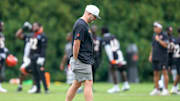 Director of player personnel Duke Tobin walks the field during practice at the Paycor Stadium practice field in downtown Cincinnati on Wednesday, Aug. 20, 2025.