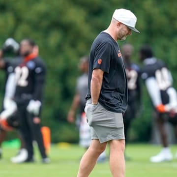 Director of player personnel Duke Tobin walks the field during practice at the Paycor Stadium practice field in downtown Cincinnati on Wednesday, Aug. 20, 2025.